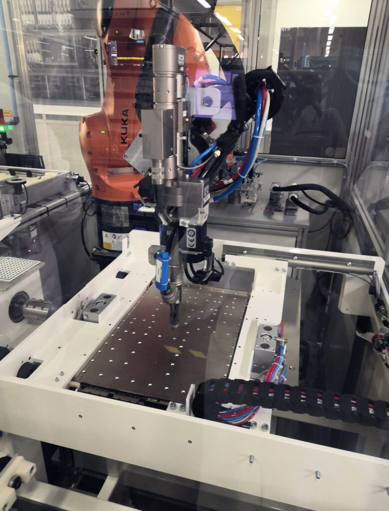 Robot automated electronics assembly and screwing