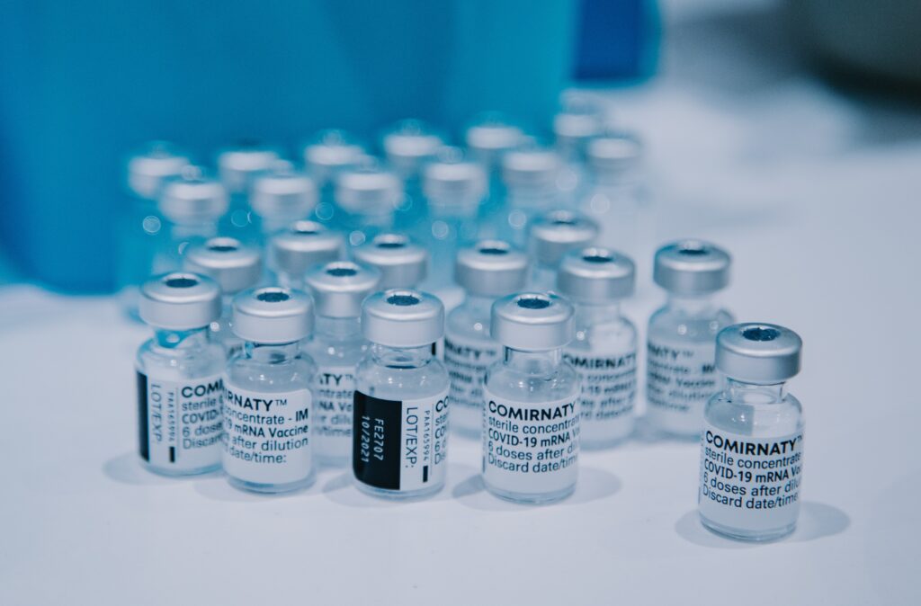 Vaccine vials are filled in automated machines